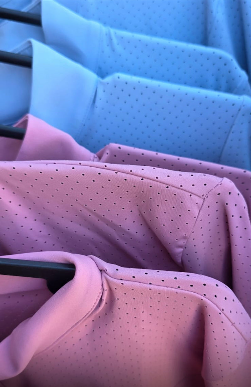 Summer base layer with perforated material